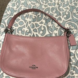 Brand New Shoulder Handbag that has a longer strap for crossbody look.